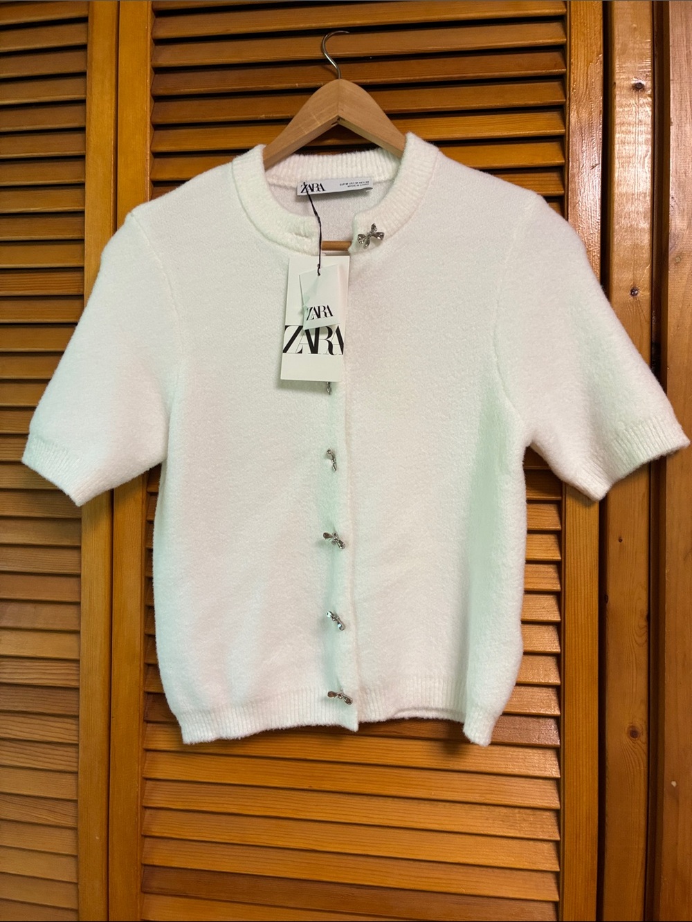 Zara White Short Sleeve Bouclé Cardigan length 20” pit to pit 17”